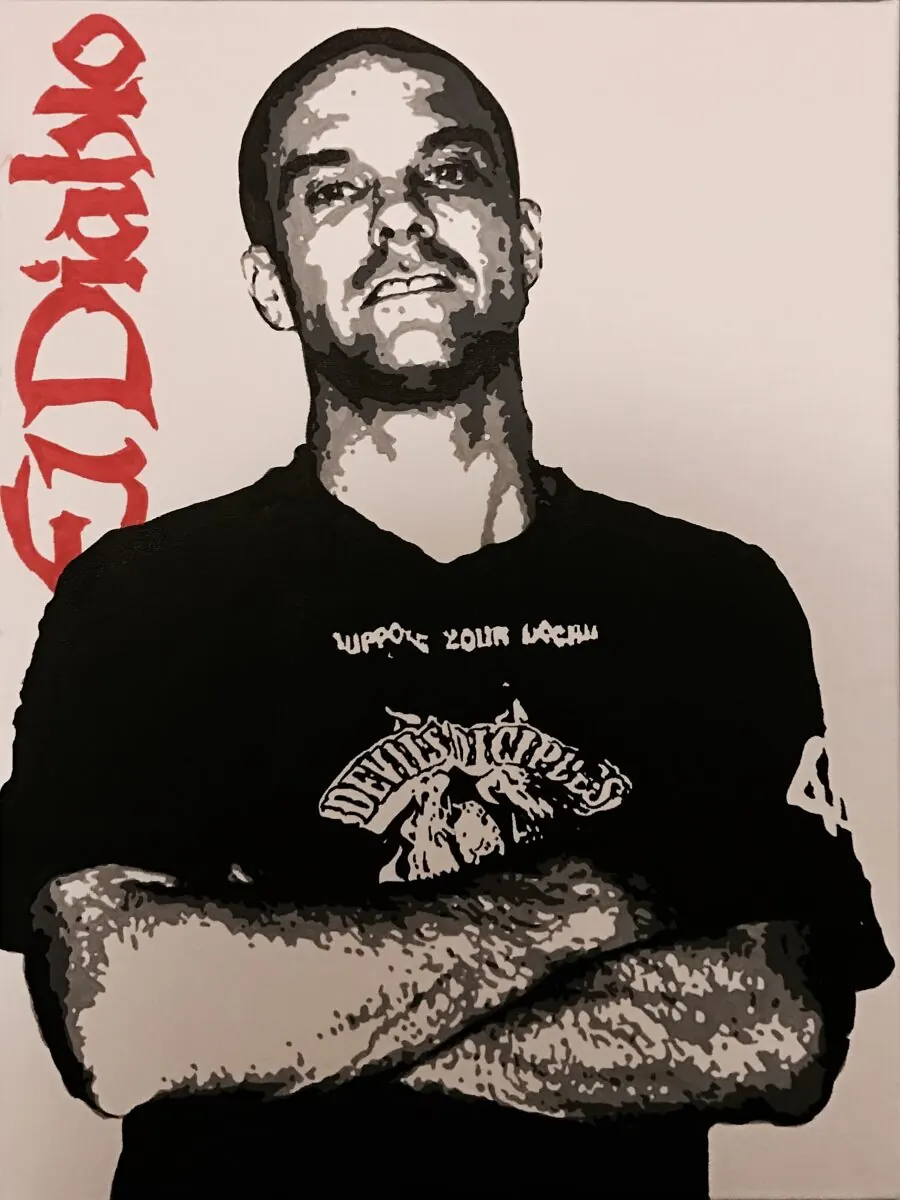 Acrylic tribute portrait of a man with folded arms, lettered El Diablo in red